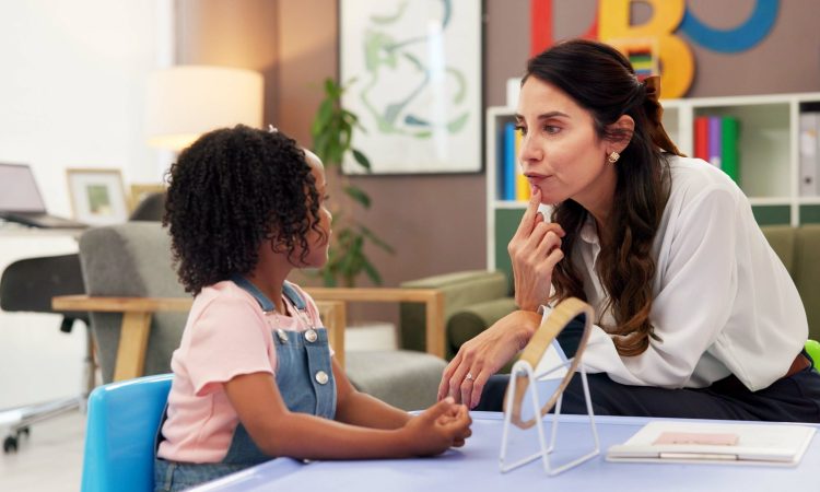 Mirror, speech therapy and help with woman and girl for language assessment, sound and teaching. Tongue placement, child development and phonics exam with therapist and kid for education consulting.